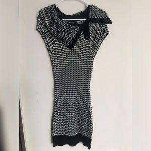 Long sleeveless sweater
